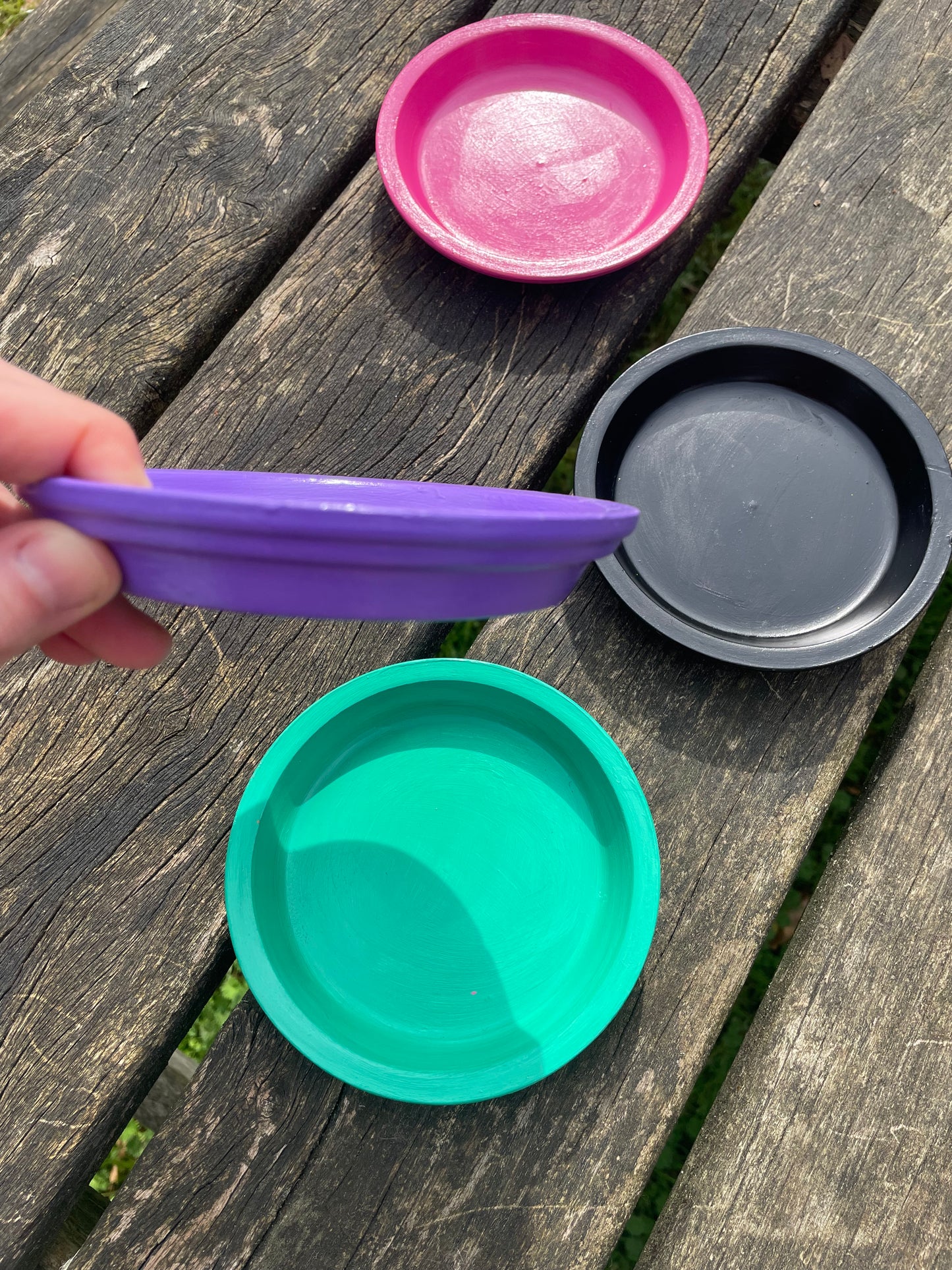 Plant pot saucers painted terracotta